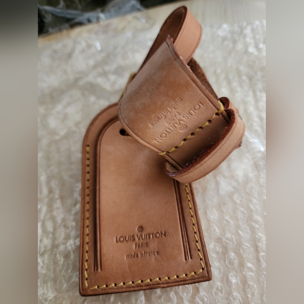 Authentic Louis Vuitton Bundle of Tag and Poignet